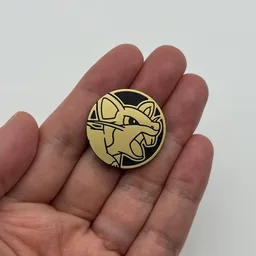 In hand, from Pokémon Coin Fan, full size