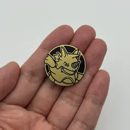 In hand, from Pokémon Coin Fan, full size