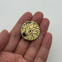 In hand, from Pokémon Coin Fan, full size