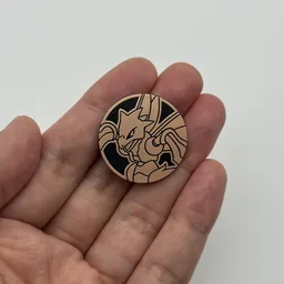 In hand, from Pokémon Coin Fan, full size
