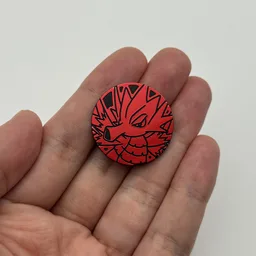 In hand, from Pokémon Coin Fan, full size