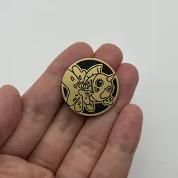 In hand, from Pokémon Coin Fan, full size