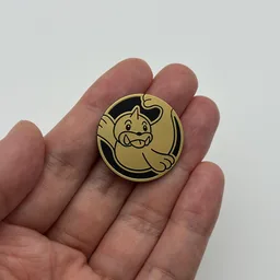 In hand, from Pokémon Coin Fan, full size