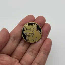 In hand, from Pokémon Coin Fan, full size