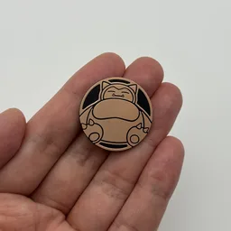 In hand, from Pokémon Coin Fan, full size