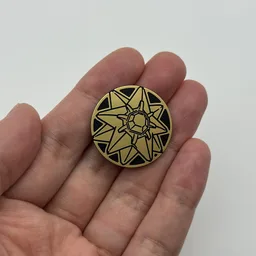 In hand, from Pokémon Coin Fan, full size