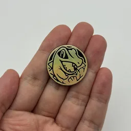 In hand, from Pokémon Coin Fan, full size