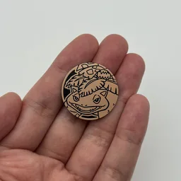 In hand, from Pokémon Coin Fan, full size