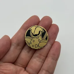 In hand, from Pokémon Coin Fan, full size