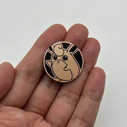 In hand, from Pokémon Coin Fan, full size