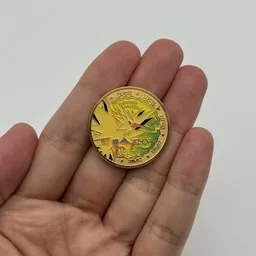 In hand, from Pokémon Coin Fan, full size