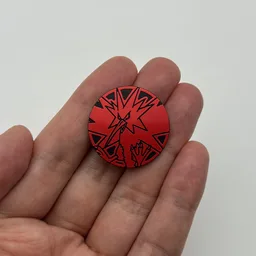In hand, from Pokémon Coin Fan, full size