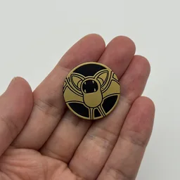 In hand, from Pokémon Coin Fan, full size