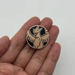 In hand, from Pokémon Coin Fan, full size