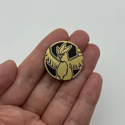 In hand, from Pokémon Coin Fan, full size