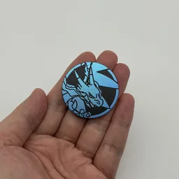 In hand, from Pokémon Coin Fan, full size