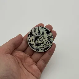 In hand, from Pokémon Coin Fan, full size