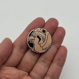 In hand, from Pokémon Coin Fan, full size