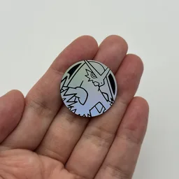In hand, from Pokémon Coin Fan, full size