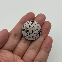 In hand, from Pokémon Coin Fan, full size