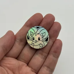 In hand, from Pokémon Coin Fan, full size