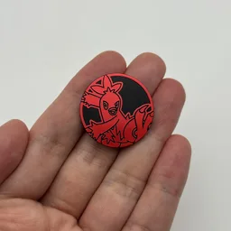 In hand, from Pokémon Coin Fan, full size