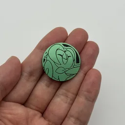 In hand, from Pokémon Coin Fan, full size
