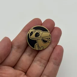 In hand, from Pokémon Coin Fan, full size