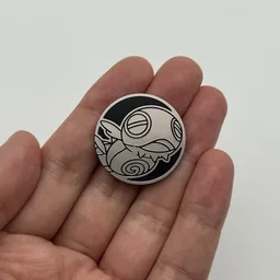 In hand, from Pokémon Coin Fan, full size
