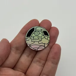 In hand, from Pokémon Coin Fan, full size