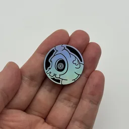 In hand, from Pokémon Coin Fan, full size
