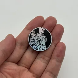 In hand, from Pokémon Coin Fan, full size