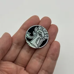 In hand, from Pokémon Coin Fan, full size