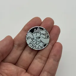 In hand, from Pokémon Coin Fan, full size