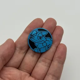 In hand, from Pokémon Coin Fan, full size