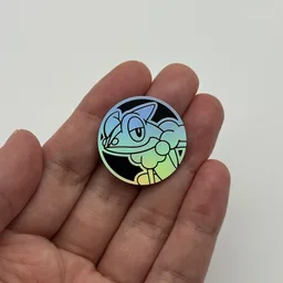 In hand, from Pokémon Coin Fan, full size