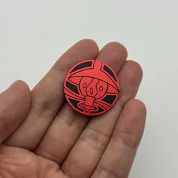 In hand, from Pokémon Coin Fan, full size