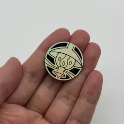 In hand, from Pokémon Coin Fan, full size