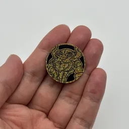 In hand, from Pokémon Coin Fan, full size