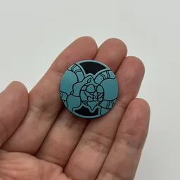 In hand, from Pokémon Coin Fan, full size