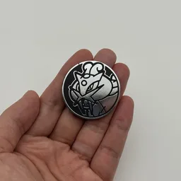 In hand, from Pokémon Coin Fan, full size