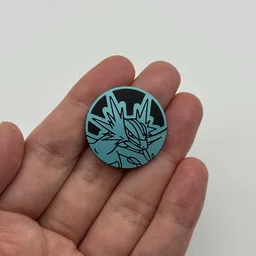 In hand, from Pokémon Coin Fan, full size