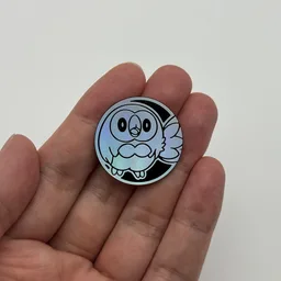 In hand, from Pokémon Coin Fan, full size