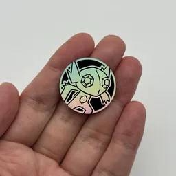 In hand, from Pokémon Coin Fan, full size