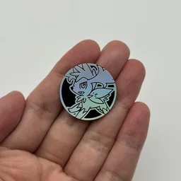 In hand, from Pokémon Coin Fan, full size