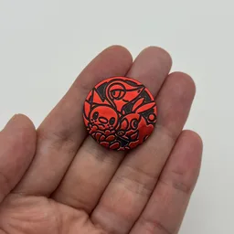 In hand, from Pokémon Coin Fan, full size