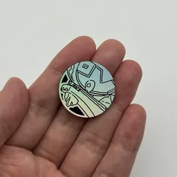 In hand, from Pokémon Coin Fan, full size