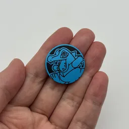 In hand, from Pokémon Coin Fan, full size