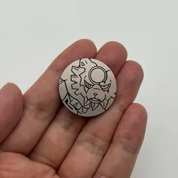 In hand, from Pokémon Coin Fan, full size