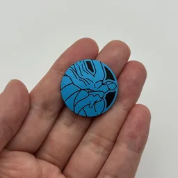 In hand, from Pokémon Coin Fan, full size
